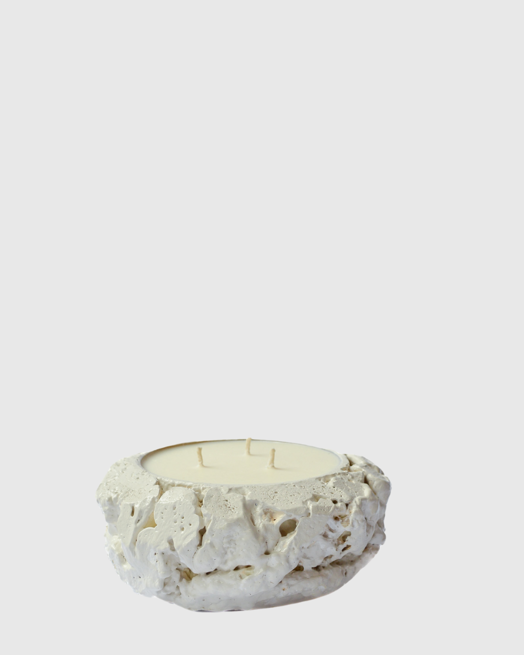 White textured ceramic candle holder with three unlit wicks in creamy wax, 500ml size.