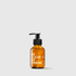 Amber glass pump bottle with white "Be Clear My Friend" text, containing facial soap.