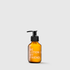 Amber glass pump bottle with white text "Be lotion my friend" on a plain light gray background.