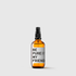 Amber glass spray bottle with black nozzle and white label reading "BE PURE MY FRIEND".