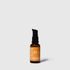 30ml amber glass bottle of almond hair oil with black pump and orange label reading "Be Silky My Friend".