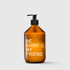 Amber pump bottle with white "Be Shiny My Friend" text hair conditioner packaging.