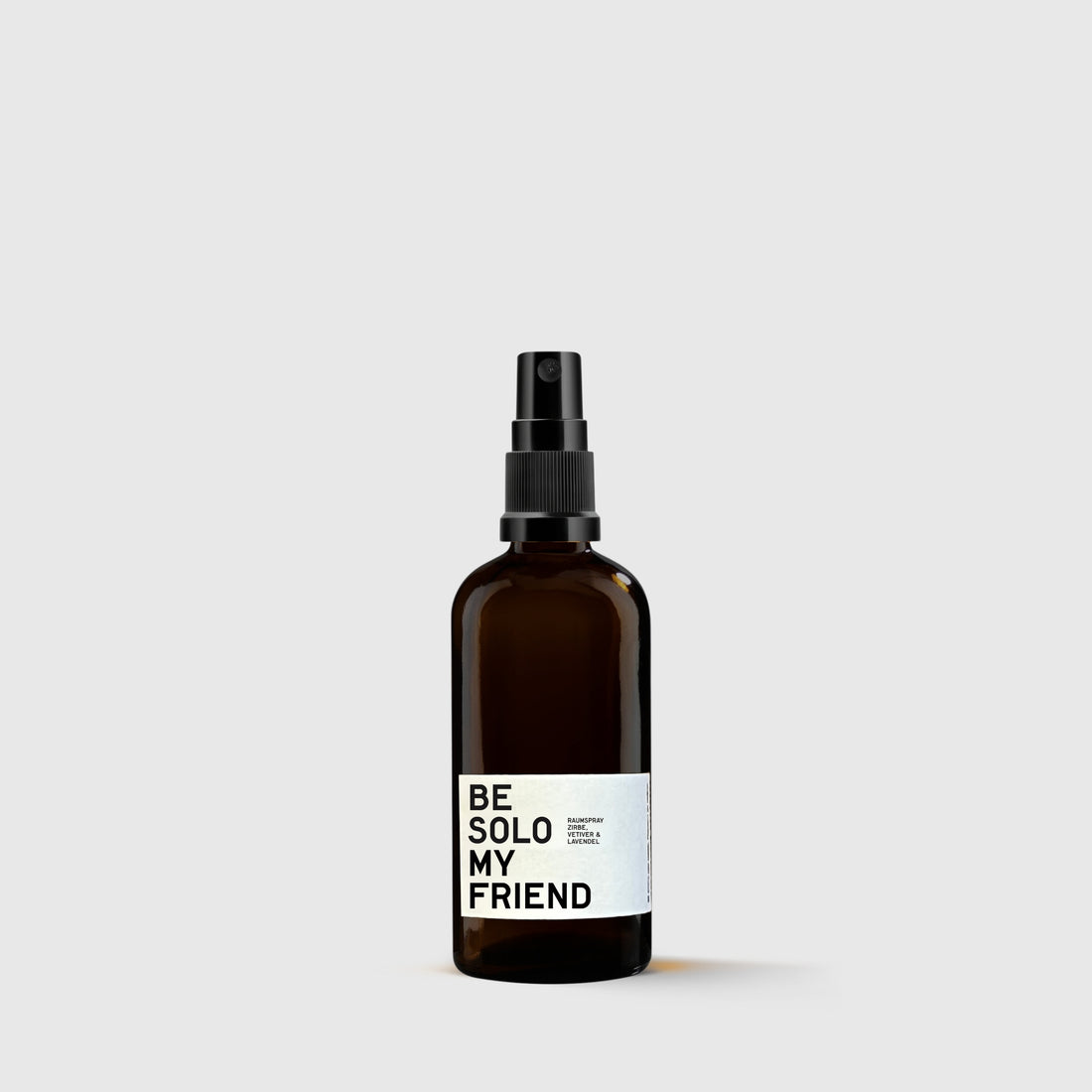 Brown glass spray bottle with black nozzle and white label reading BE SOLO MY FRIEND.