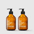 Two amber glass soap dispensers with black pumps and white "BE SOAP MY FRIEND" text.