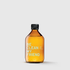 Amber glass spray bottle with black cap and white "BE CLEAN MY FRIEND" text label.